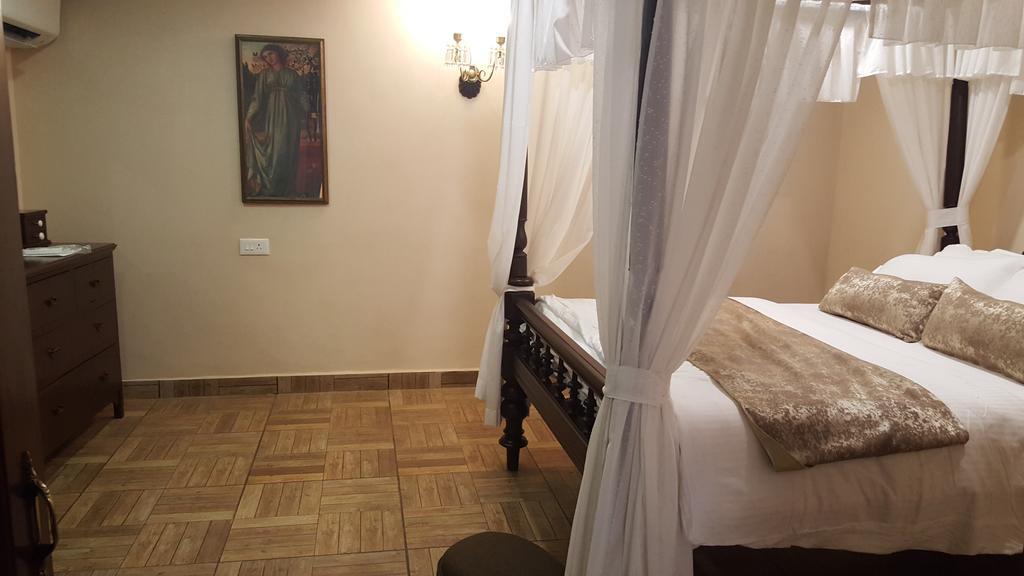 Casa Menezes - A Heritage Goan Homestay Bambolim Zimmer foto