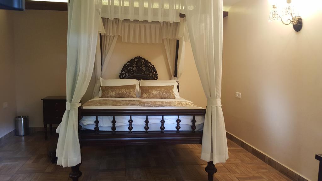 Casa Menezes - A Heritage Goan Homestay Bambolim Zimmer foto
