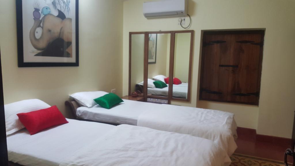 Casa Menezes - A Heritage Goan Homestay Bambolim Zimmer foto
